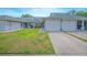 Inviting townhome with a two-car garage and neatly maintained front yard at 4541 Southfield Ave, Orlando, FL 32812