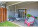 Covered patio with comfortable seating and a view of the home's interior at 4541 Southfield Ave, Orlando, FL 32812