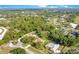 Beautiful aerial view of a suburban community with tree-lined streets and well-maintained homes at 477 Eagle Brook Ct, Debary, FL 32713