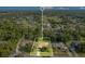 Aerial shot of property lines and golf course, highlighting the landscaped yard and surrounding community at 477 Eagle Brook Ct, Debary, FL 32713