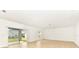 Bright living space with tile floors and sliding doors leading to outdoor area at 4792 Vellacito Way, Davenport, FL 33897
