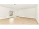 Neutral-toned room featuring tile flooring, a window, and electrical outlets at 4792 Vellacito Way, Davenport, FL 33897