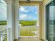 Balcony with a water view and pillars at 5 Riverwalk Dr # 601, New Smyrna Beach, FL 32169
