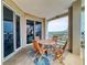 Balcony view with outdoor table and chairs and beautiful vistas of the water at 5 Riverwalk Dr # 601, New Smyrna Beach, FL 32169