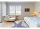 Bedroom offering a relaxing view and a comfortable chaise lounge at 5 Riverwalk Dr # 601, New Smyrna Beach, FL 32169