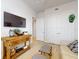 Comfortable living room featuring wood floors and a stylish console table at 5 Riverwalk Dr # 601, New Smyrna Beach, FL 32169