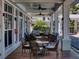 A covered outdoor patio space with comfortable seating arrangements for community residents at 5 Riverwalk Dr # 601, New Smyrna Beach, FL 32169