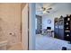 Hallway showing access to a half bathroom and an office space with decorative wall at 5164 Chickadee St, St Cloud, FL 34771
