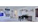 Spacious loft area with desk, rocking chair, and themed wall decor at 5164 Chickadee St, St Cloud, FL 34771