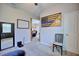 Versatile room with a unique accent wall, carpet and ample natural light at 5164 Chickadee St, St Cloud, FL 34771