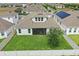 Aerial view of fenced backyard and screened in patio, perfect for outdoor enjoyment at 5427 Orange Orchard Dr, Winter Garden, FL 34787