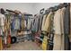 Spacious walk-in closet with ample storage space for clothing, shoes, and accessories at 5427 Orange Orchard Dr, Winter Garden, FL 34787