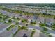 Neighborhood aerial view of a residential area with well-maintained homes and green spaces at 553 Adenmore Ter, Deland, FL 32724