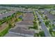 Aerial view of a residential street showing single-Gathering homes with well-maintained lawns and mature trees at 553 Adenmore Ter, Deland, FL 32724