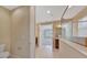 Bright bathroom featuring neutral tones, tile floors, granite vanity, and glass shower at 553 Adenmore Ter, Deland, FL 32724