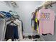 Organized closet with shelving and hanging space, offering ample storage solutions at 6100 Westgate Dr # 101, Orlando, FL 32835