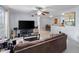 Cozy living room with a TV and a dining table in the background, creating an inviting living space at 6100 Westgate Dr # 101, Orlando, FL 32835