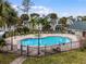 Community pool with ample seating, perfect for relaxation and socializing at 6100 Westgate Dr # 101, Orlando, FL 32835
