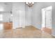 Dining area featuring tile flooring and a view to other parts of the home at 618 Meadow Park Dr, Minneola, FL 34715