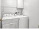Functional laundry area with washer and dryer at 618 Meadow Park Dr, Minneola, FL 34715