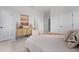 Cozy bedroom with stylish furniture, soft textiles, and ample space for personal expression at 6340 Chorus Dr, Mascotte, FL 34753