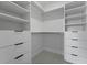 Well-organized closet with ample shelving and drawers for efficient storage solutions at 6340 Chorus Dr, Mascotte, FL 34753