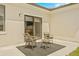 Outdoor patio space with seating for relaxing or entertaining guests at 6384 Chorus Dr, Mascotte, FL 34753
