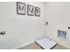 A laundry area with artwork and a washing machine hook-up at 7054 Painted Bunting Way, St Cloud, FL 34773