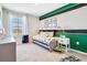 Inviting bedroom featuring truck themed decor, a comfy twin bed, and a large window at 7059 Painted Bunting Way, St Cloud, FL 34773
