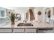 Open-concept kitchen with granite countertops, stainless steel appliances, and view of stairs at 7059 Painted Bunting Way, St Cloud, FL 34773