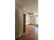 Cozy bedroom with wood floors, closet, ceiling fan, and natural light at 7228 Spring Villas Cir, Orlando, FL 32819