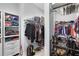 Organized walk-in closet with shelving and hanging space for clothes and shoes at 7873 Dausset St, Orlando, FL 32827