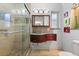 Modern bathroom with a glass-enclosed shower, stylish vanity, and contemporary fixtures at 100 Kennison Dr, Orlando, FL 32801