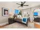 Bright bedroom with a large window, stylish furnishings, and a cozy atmosphere at 100 Kennison Dr, Orlando, FL 32801
