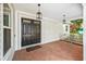 An exterior view showing the front porch with a double door entry at 101 W Oakland Ave, Oakland, FL 34760