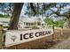 Charming ice cream shop with a welcoming exterior and visible 'Ice Cream' signage at 101 W Oakland Ave, Oakland, FL 34760