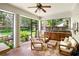 The outdoor patio has a ceiling fan and seating for entertaining at 101 W Oakland Ave, Oakland, FL 34760