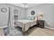Comfortable bedroom featuring ample natural light, ceiling fan, and neutral decor at 1024 Destin Dr, Lake Wales, FL 33898