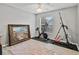 Home gym with exercise bike, climbing machine, and natural light at 1024 Destin Dr, Lake Wales, FL 33898