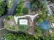 Overhead view of recreational facilities, including a basketball court, tennis court, and beach volleyball at 103 Greenleaf Ln, Altamonte Springs, FL 32714