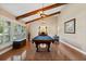 Billiards room with vaulted beamed ceilings, hardwood floors, large windows and a comfortable atmosphere at 103 Greenleaf Ln, Altamonte Springs, FL 32714