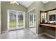 Laundry room featuring tile floor, closet, vanity, mirrors, and lots of natural light at 103 Greenleaf Ln, Altamonte Springs, FL 32714