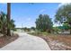 Serene community park featuring a paved walkway, playground, and scenic views, perfect for recreation and relaxation at 103 Greenleaf Ln, Altamonte Springs, FL 32714