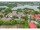 Aerial view showcasing the community's proximity to the lake with townhouse neighborhood at 1062 Winglewood, Altamonte Springs, FL 32714