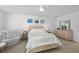 Bright bedroom with a light wood bed frame and matching dresser at 1062 Winglewood, Altamonte Springs, FL 32714