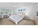 Bedroom features a light wood bed, shuttered windows, and neutral decor at 1062 Winglewood, Altamonte Springs, FL 32714