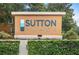 Welcoming Sutton Place community sign surrounded by lush greenery and landscaping at 1062 Winglewood, Altamonte Springs, FL 32714