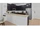 Modern kitchen with stainless steel appliances and granite countertops at 1062 Winglewood, Altamonte Springs, FL 32714
