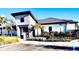 Exterior of modern building with stone accents and accessible parking at 1082 Trappers Trail Loop, Davenport, FL 33896