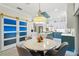 Kitchen area with dining table at 1082 Trappers Trail Loop, Davenport, FL 33896